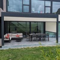 Installation d'une pergola réctrable (modèle OPEN R2) à Arlon